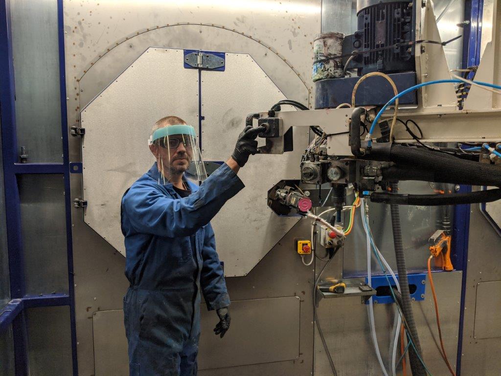 Worker doing product testing